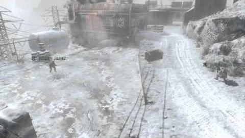 A snowbound rail yard in heavy fog, a numbered truck up the slope and players tagged on both sides of the tracks.